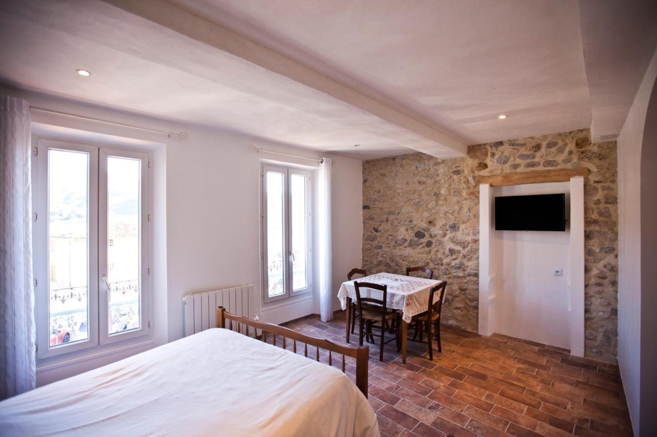 Hotel De La Place Mezel  Buitenkant foto